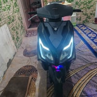 ديوانية • دراجة كهربائية • أوراق