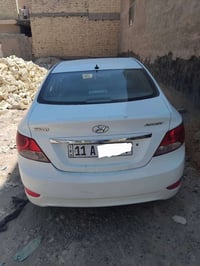 اكسنت ٢٠١٢ • بيضاء • رقم بغداد