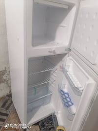 ثلاجة • نضيفه • غراض البيت
