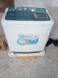 غسالة مستعملة • عربانة أطفال • قابلة تفاوض