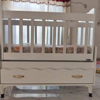 سرير اطفال • هزاز