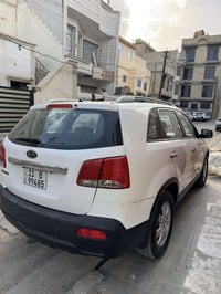 سورينتو 2012 خليجي ٤ قطع صبغ كير مكينه صدر تبريد جاهز  رقم بغداد تحويل...