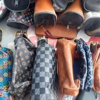 تصفية جملة • محفظة يدوية • درزن