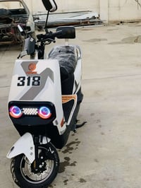 دراجة كهربائية • ٣١٨ • نفس الصورة