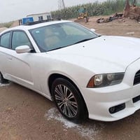 جارجر 2013 حادث خفيف جاملغ خلفي  بدون ايرباک فول مواصفات  سنويه لحد 20...