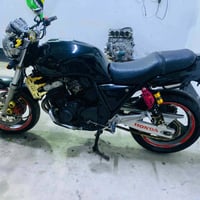 هوندا سي بي فور • محرك SV400 • مكمرك