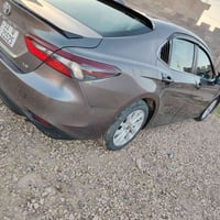 كامري2022 حره تحويل مباشر  رقم بغداد ضرر بنيد جاملغ لسعر180قابل لتفاوض...