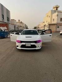 دوج جارجر 2019 sxt محرك 3600 رقم بغداد  محدثه كت SRT  ويلاه 19 جدد بصم...