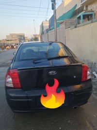 سياره للبيع كيه اسبكتره موديل 2000 ..سياره ابسمي سنويه ل 27 هزه جديده ...