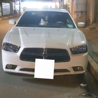 جارجر ٢٠١١  ٥٧٠٠ هيمي  رقم بغداد انكليزي بأسمي  بدون ضربة بدون صبغ فقط...