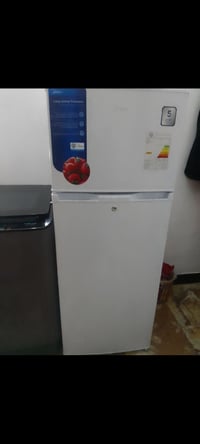 ثلاجة جديدة • ١٠ قدم • ضمان ٥ سنوات