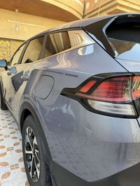 كيا سبورتج 2024 لون سمنتي  السياره بحاله الوكاله كفاله عامه كير محرك ش...