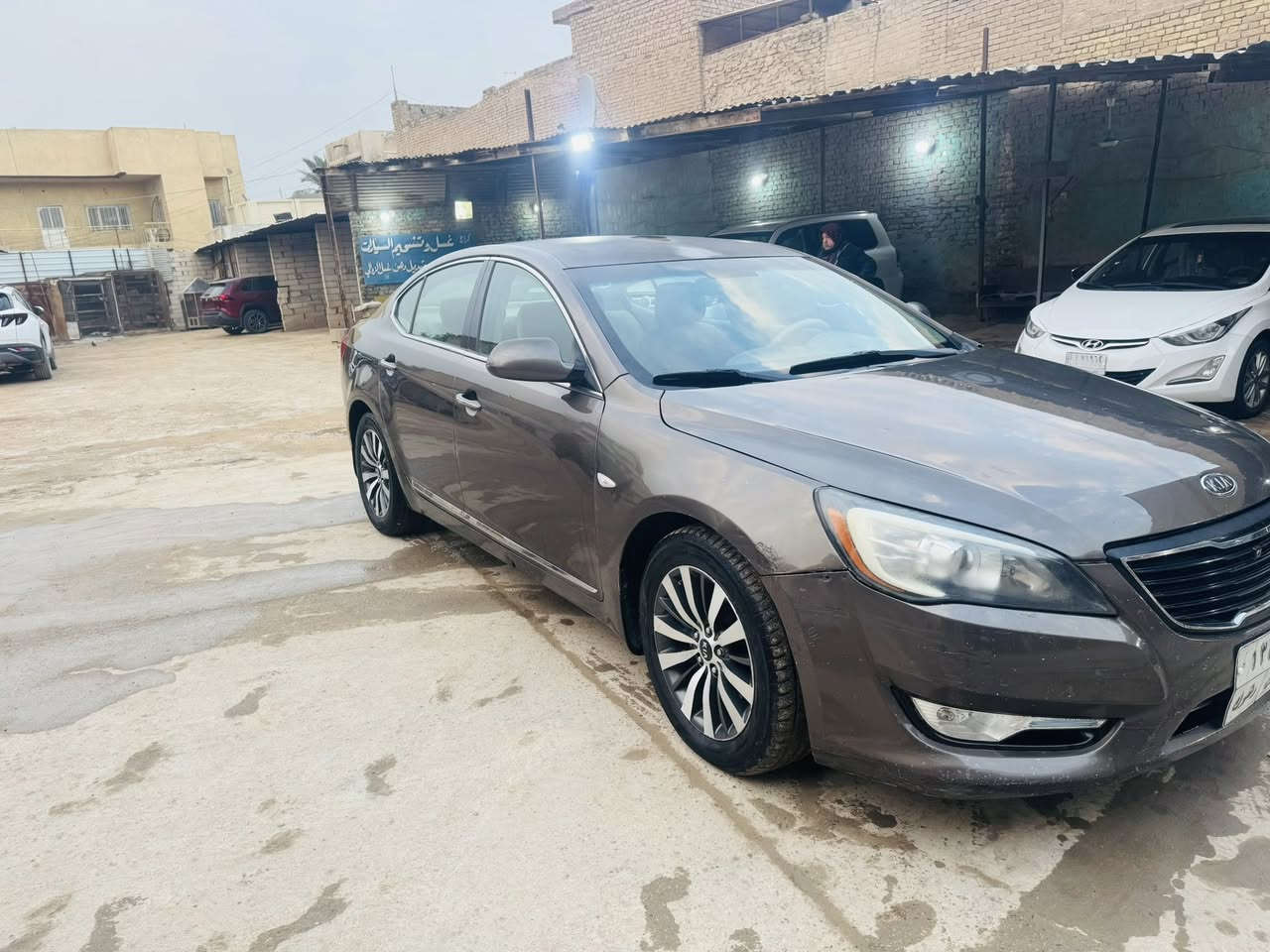 كيا كادنزة 2013 خليجي سيارة جديدة بيه طخةبلجاملغ الامامي والباقي كل مكفول مكينة 3500 مكينة وكير وحدادية وتبريد كل جديد رقم دهوك بسمنة تحويل وكالة السعر 87 رقمي *********** مكان السيارة حلة المركز
