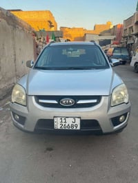 سبورتج 2009  السيارة بدون صبغ    بدون ضربة طخات فقط كما موضح في الصور ...