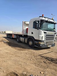 سكانيه للبيع موديل 2012 حجم 420 محرك انجكسور مرسم وراها عربانه 5 محاور...