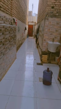 حي الحسين • بيت خلفي • مقسم شقتين