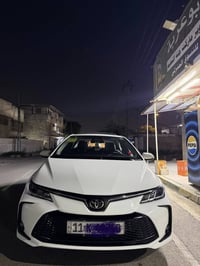 كورلا 2025  هايبرد  العلامه. الجديده  فول مواصفات 1/1   داخل جلد اسود ...