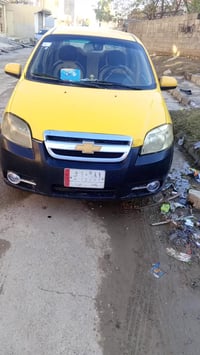 سياره افيو للبيع وارد كوري مديل 2012مصفره هئيه وغرامات كابون بيها سنوي...