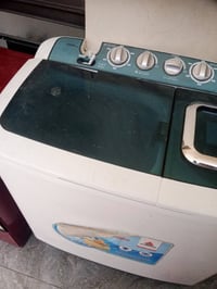 بغداد الطوبجي • طباخ • غساله