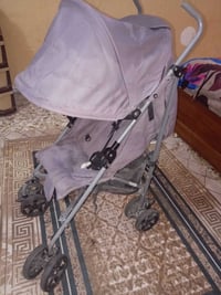 عربانة طفل • رصاصي • نضيفة