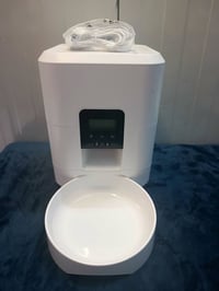 موزع أكل أوتوماتيكي • للقطط والكلاب