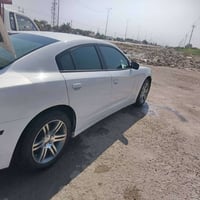 جارجر ٢٠١١ • حدادية جديدة • ضرر قدام بسيط