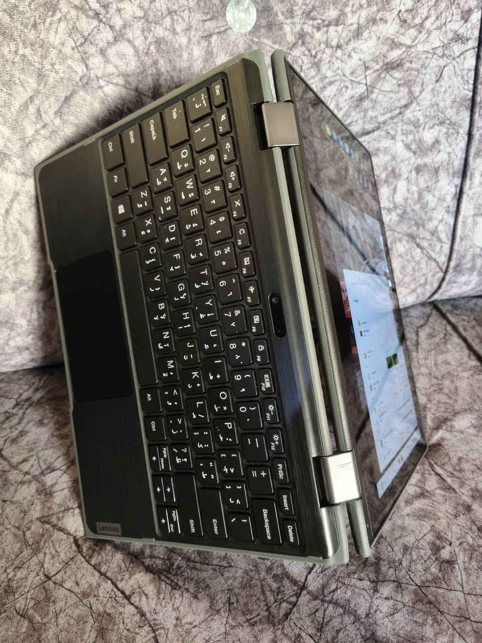 السلام عليكم لابتوب Lenovo حديث سلم (الجيل الثامن والشاشة لمس) مواصفات راقية جداً استخدام شخصي نظيف جداً للبيع بسعر مناسب 160 ألف اقوى لابتوب ممكن تحصله ومكفول عالفحص من جميع النواحي تفحصه يلا تدفع حقه
اللابتوب خدمي جداً وممتاز لطلاب الجامعات والبحوث لأن بي كل اللمميزات الي يحتاجوها 

مشغل عليه كل أنواع البرامج الدراسية مثل الكلاس روم والادوبي ريدر قارئ ملفات PDF والملازم وبرامج الطباعة والتصميم مثل الفوتوشوب وحزمة برامج الاوفيس كاملة الوورد والاكسل والبور بوينت وكل برامج مواقع التواصل الإجتماعي وبرامج التحميل وغيرهن من البرامج 

مواصفات اللابتوب: 
النظام احدث نظام بالعالم ويندوز 11 برو 64 بت بأحدث التعريفات والبرامج كل شي مفعله مدى الحياة
المعالج الجيل الثامن Celeron N4100 
الهارد 128GB SSD اسرع واحدث نوع
الرام 4GB سريع جداً نوع DDR4
كارت شاشة انتل 2GB نوع عالي الاداء
حجم الشاشة 12.5" إنش فول HD دقة عالية جداً
الشاشة لمس قابلة للطي 360° يعني يصير ايباد
يحتوي على بلوتوث + وايفاي
يحتوي على كامرتين امامية وخلفية
بطارية فوق الممتازة أكثر من 3 ساعات تشغيل مستمر
الجهاز بي كل أنواع المنافذ: 2 منافذ USB ومنفذ تايب سي ومنفذ HDMI ومنفذ رام ومنفذ هيدفون 

ملحقات اللابتوب شاحنته الأصلية تايب سي 65 واط والجنطة 

*********** واتساب و اتصال
