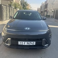 للبيع كونا 2024 مرقم وجاهزه باسمي لون اسمنتي  سيارة على وضع الشركة ناع...