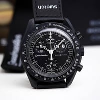 اوميغا سواتش • مكينة كوارتز • بيوسيراميك