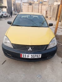 لانسر جديده للبيع 2010 سياره بيهه حزام صبغ السعر 65ورقه بغداد     هاتف...