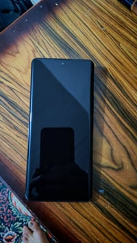 ٢٥٦ • كاميرات لايكا • شاحن ٩٠W