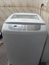 غسالة ملابس • الكترونيات منزلية