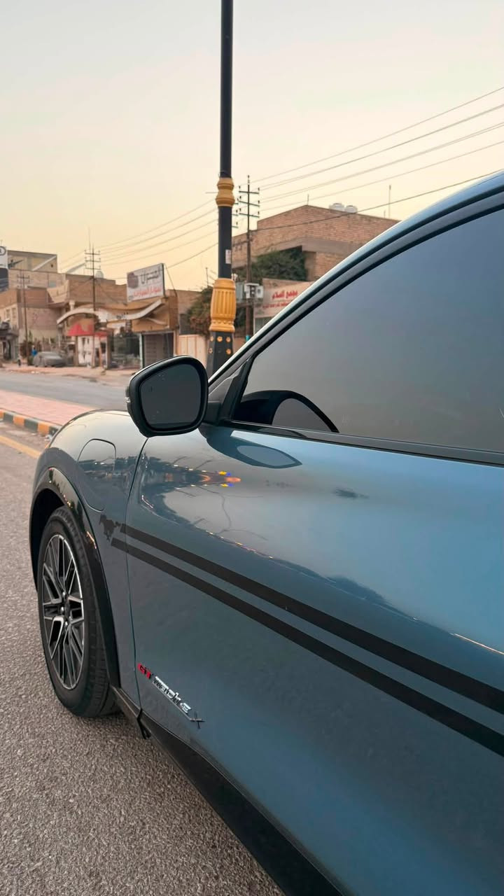 مراوس فقط حسب القناعة 2024
‏ FORD MUSTANG MACH-E Premium X
فورد موستنك ماك-اي
‏بريموم X
تكون اعلى فئة 
تمشي بالشحنة الكاملة 480 كيلو
‏Full Electric 
 كهربائية بالكامل

السيارة بحالة الوكالة ماشية 15 مايل فقط
حادثها بيبان ثنين مبدلات اصليات ومصبوغات
السيارة على وضع الوكالة استيراد شخص واحد
بطارية ليثيوم أيون
 البطارية جبيره
مداخل شحن (AC/DC)
مرقم بغداد بأسمي مداور ثاني يوم
المواصفات : بصمة فتح وتشغيل/ مثبت سرعة/  ترحيب /انارة محطية 12 لون/
شاشة بحجم 15,5 بوصة/ 3أنظمة قيادة/ Navigation / أضوية زنون/ كشافات ضباب LED/ غمازات على المري/ مري كهرباء/ بلوتوث/ سنتر لوك/ زجاج كهربائي (Full Auto)/ مثبت سرعة/  4 بصمات
بانوراما |panorama view 
شاشة تدعم اللغة العربية | Arabic screen 
حساسات أمامية وخلفية | Front & Back sensors 
تحكم طارة  | control wheel
صندوق كهربائي | Electric Back Door 
انارة داخلية مخفية | Concealed interior lighti
كاميرات محيطية 360 | cameras 360 
رادار تفاعلي ذكي | Adaptive cruise control 
كراسي جلد | Leather seats 
كرسي مدفأ | Heated seat
كرسي كهربائي | Electric seat
كرسي ذاكرة | memory seat
نقط عمياء | Blind spot 
مري جانبية قابلة للطي | Foldable side mirror
شاحن لاسلكي | wireless charger 
‏B&O sound system | نظام صوتي B&O
‏Apple CarPlay 
‏Android Auto 
***********
متواجد واتساب
