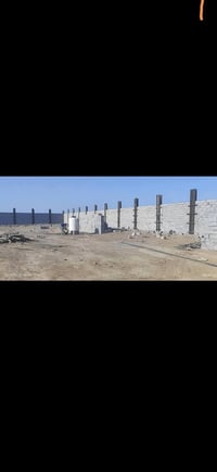 أرض خلف بناء • بلوك طابوق • داخل بغداد