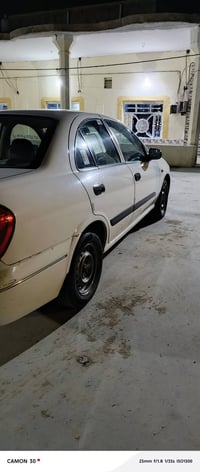 نيسان صني ياباني مكفوله كفالة عامه رقم بغداد انكليزي سياره جاهزة مجهزة...