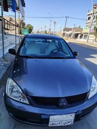 لانسر ٢٠٠٨ • كير اوتو • رقم اربيل