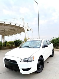 لانسر LX • ٢٠١٦ • ١٢٨٠٠٠ كم