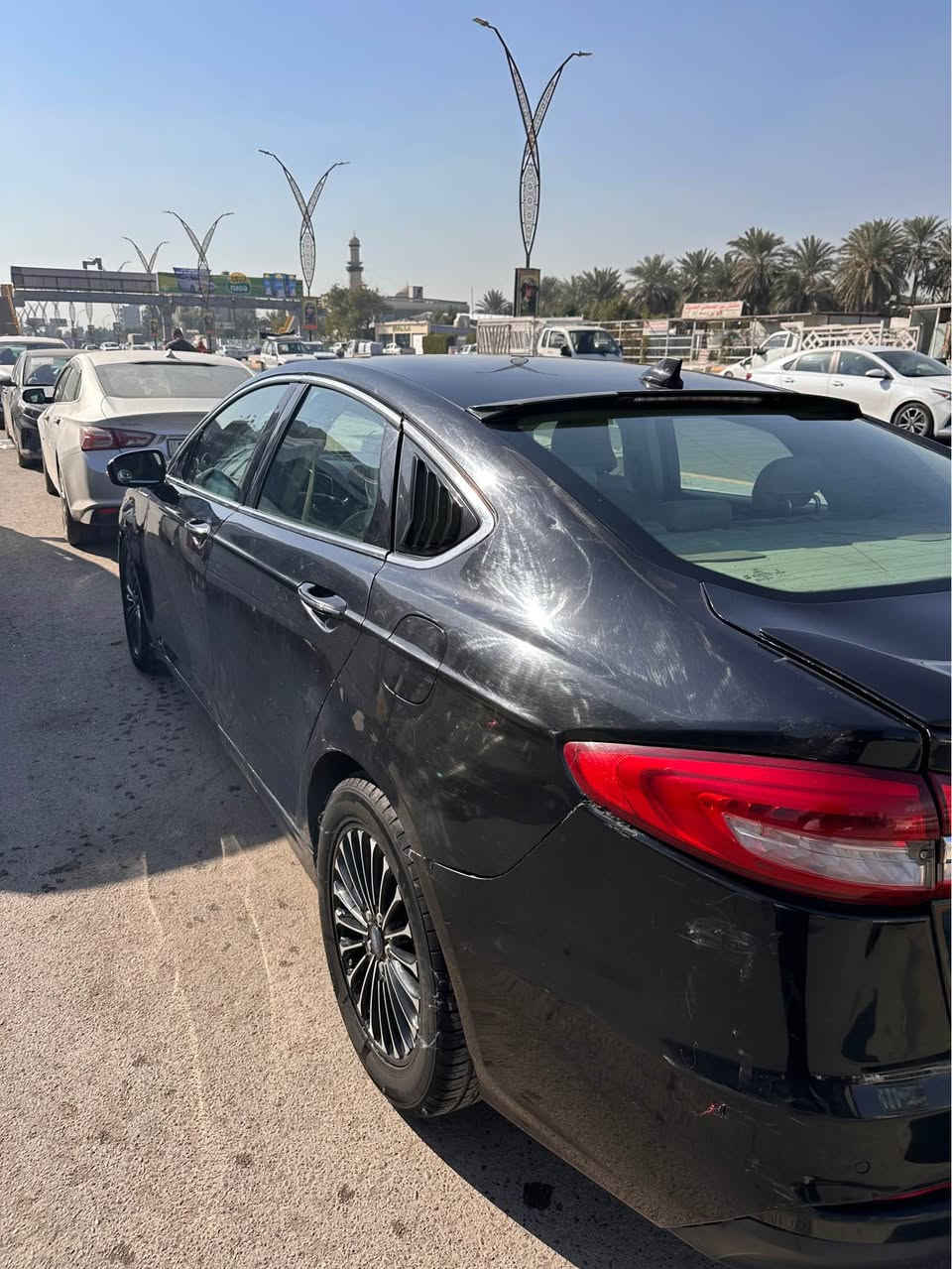 فورد فيوجن 2019 SE
 ماشية 175 الف كيلو متر
السيارة گير و مكينة كلشي مكفول بيها 
1500 تيربو 
السيارة حادثها جاملغ خلفي و بيها كم قطعة ف ابيع حزام و السونار موجود
فول مواصفات عدا الفتحة
كشنات جلد، تدفئة
تبريد قطعتين، هاند بريك بصمة،تشغيل عن بعد،رادار، حساسات خلفية، تحديد مسار، شفتات ستيرن، تحكمات ستيرن، كشنات امامية كهرباء، كشنات خزن ميموري ، جام رباعي اوتو، شاشة اعطال، كار بلي، مري قلاب، auto start/stop

رقم بغداد و بأسمي تحويل ثاني يوم

نقصها
غاز للتبريد، دعامية امامية, بطاين امامية،ماطور الauto start/stop
الباقي كلشي كامل ومكفول

السعر 103 ورقة و بيها مجال 
مكاني بغداد الغدير
*********** بغداد, العراق
