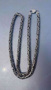 ١١٢ غرام • فضة • قفل