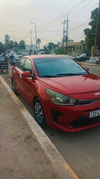 موديل 2022 للبيع كيا ريو وارد امريكي رقم بغداد انكليزي محرك 1600 شاشه ...