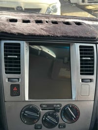 شاشة تسلا • نيسان تيدا/ڤيرسا • رام ٢ جيجا