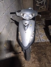 سكوتر بنزين • ٩٠ سي سي • أوتوماتيك CVT