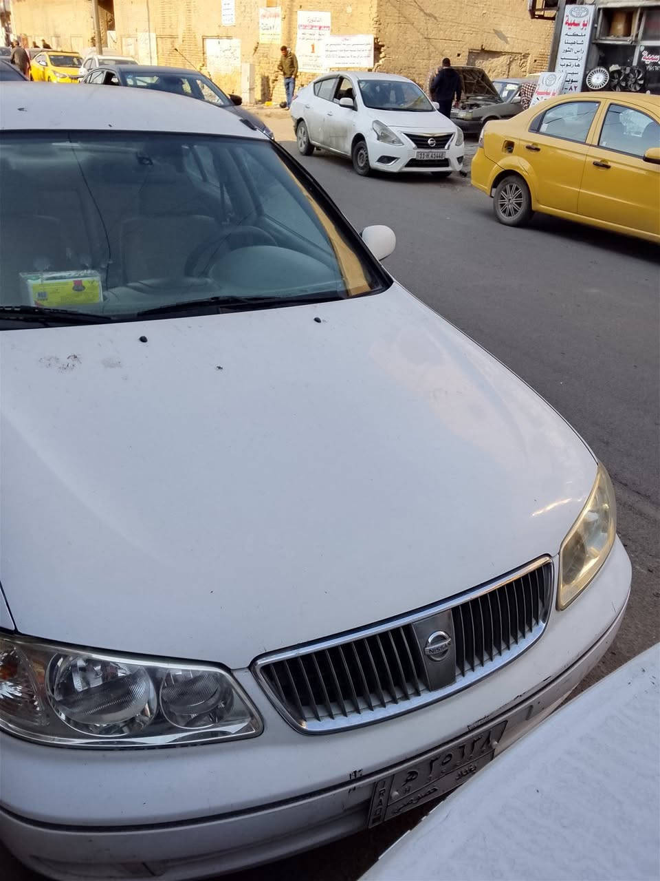 نيسان سني موديل ٢٠٠٩ استيراد الشركه العامه لسيارات سنويه ل٢٠٢٩ سياره مكفولة كفالة عامة من الضربه والصبغ والمعجون كير او مكينه او تبريد او تدفئة مكفولات سياره من ٢٠٠٩ لليوم هية عدنه وريد انجدد رايدنهة ب ١١٥ او بيها مجال بصيط مكاني بغداد تحويل ثاني يوم ***********
