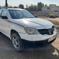 ميسوبيشي  اوتلاندر  لبيع سعرها 55 ورقه او بيه مجال موديل 2006 بغداد زع...
