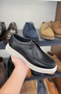 صنع في العراق • جلد طبيعي • خانقين