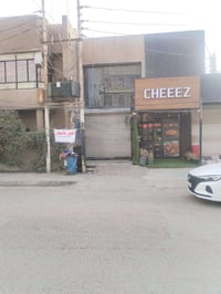 العنوان: فرصة ذهبية في قلب الدورة - شارع حي الشرطة! 📍  للإيجار، محل تج...