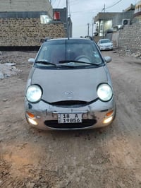 كيو كيو • ٢٠١١ • باسمي