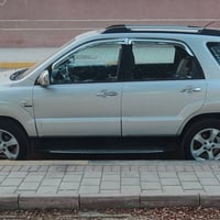 سبورتج للبيع موديل 2009  مال جناي رقم بغداد مشروع وطني  السيارة باسمي ...