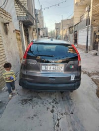 سيارة CRV للبيع موديل 14 باسمي السعر 100 موبيايلي 07704525494