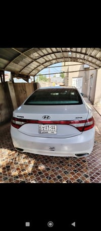 للبيع ازيرا موديل 2013 فول مواصفات 1/1 خليجي بسمي رقم بغداد كفاله عامه...